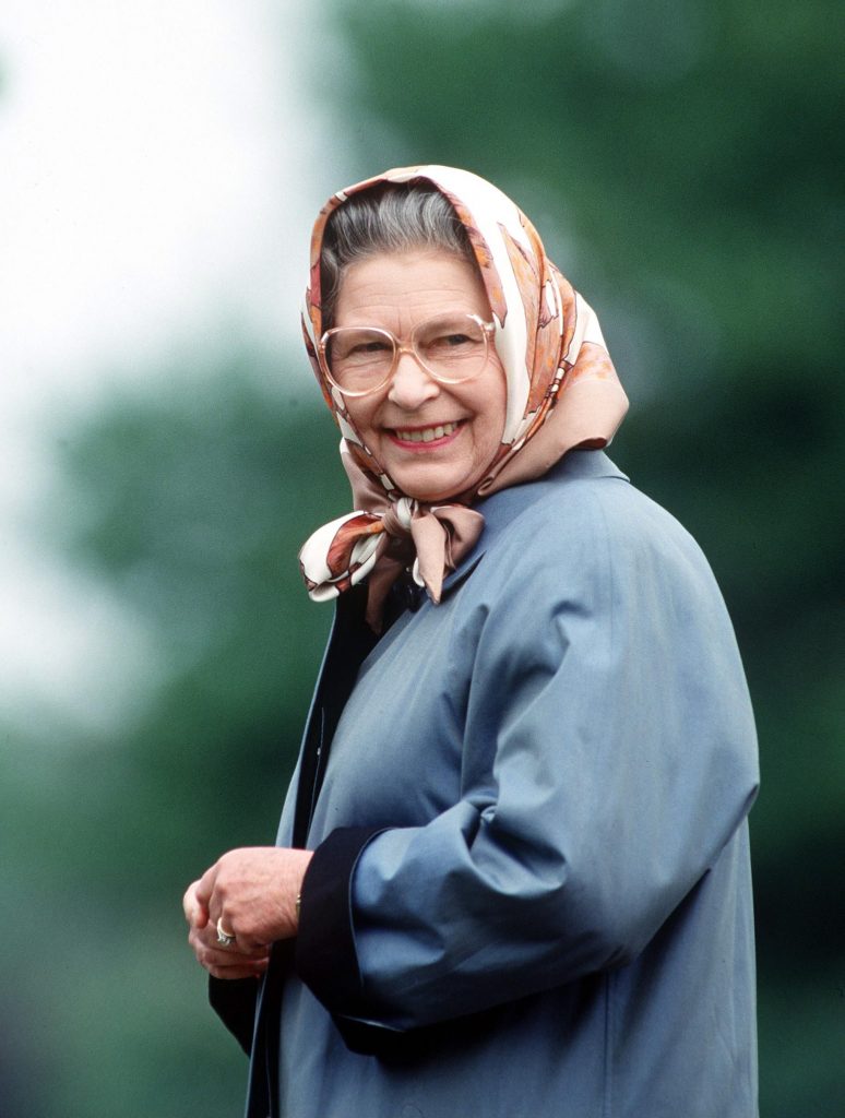 [Photo of Queen Elizabeth II in a headscarf]